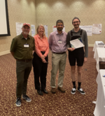 Zachary Mathe (far right) with the organizers of the conference (from left to right): John Peters, Wendy Shaw, Eric Wiedner.
